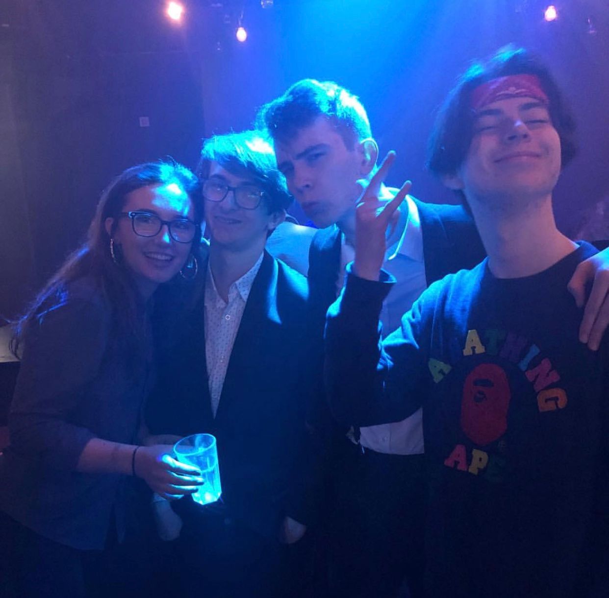 Image may contain: Night Club, Glasses, Accessories, Accessory, Night Life, Club, Person, Human