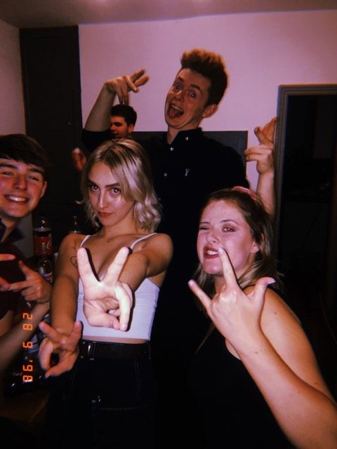 Image may contain: Photography, Portrait, Photo, Night Life, Female, Bar Counter, Pub, Clothing, Apparel, Smile, Night Club, Face, Club, Party, Human, Person