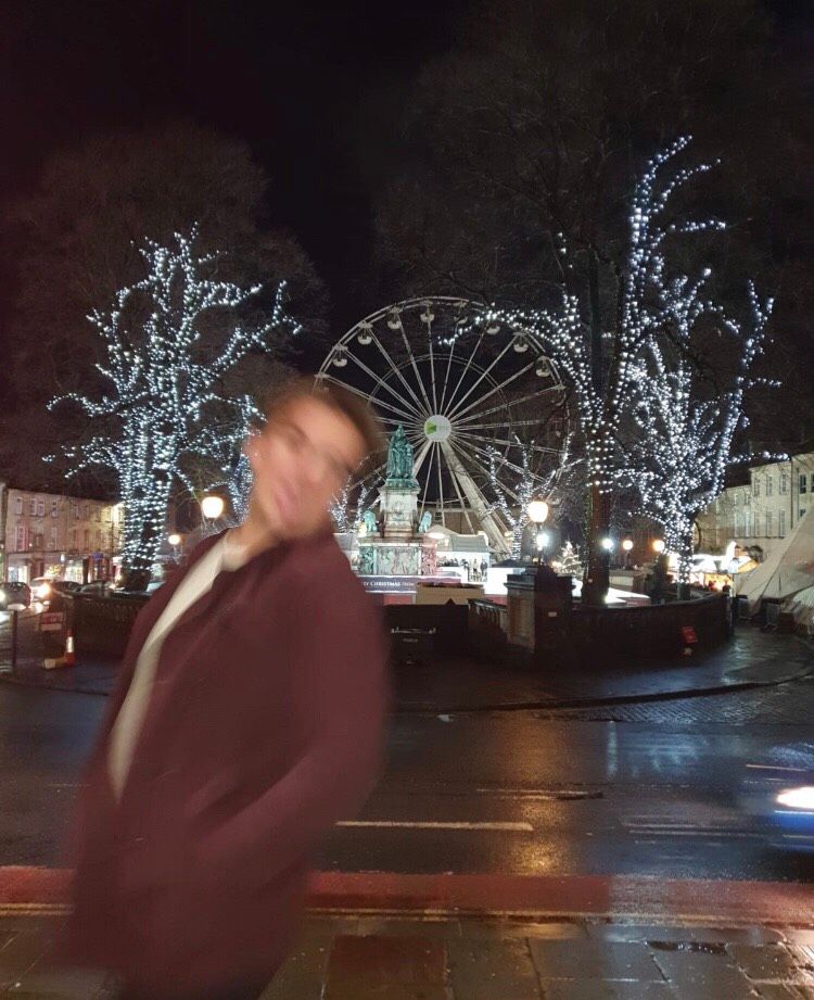 Image may contain: Lighting, Tarmac, Asphalt, Theme Park, Ferris Wheel, Amusement Park, Person, Human