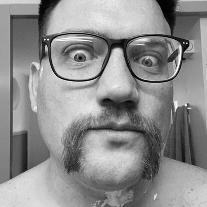 Image may contain: Sunglasses, Mustache, Face, Accessories, Glasses, Accessory, Person, Human