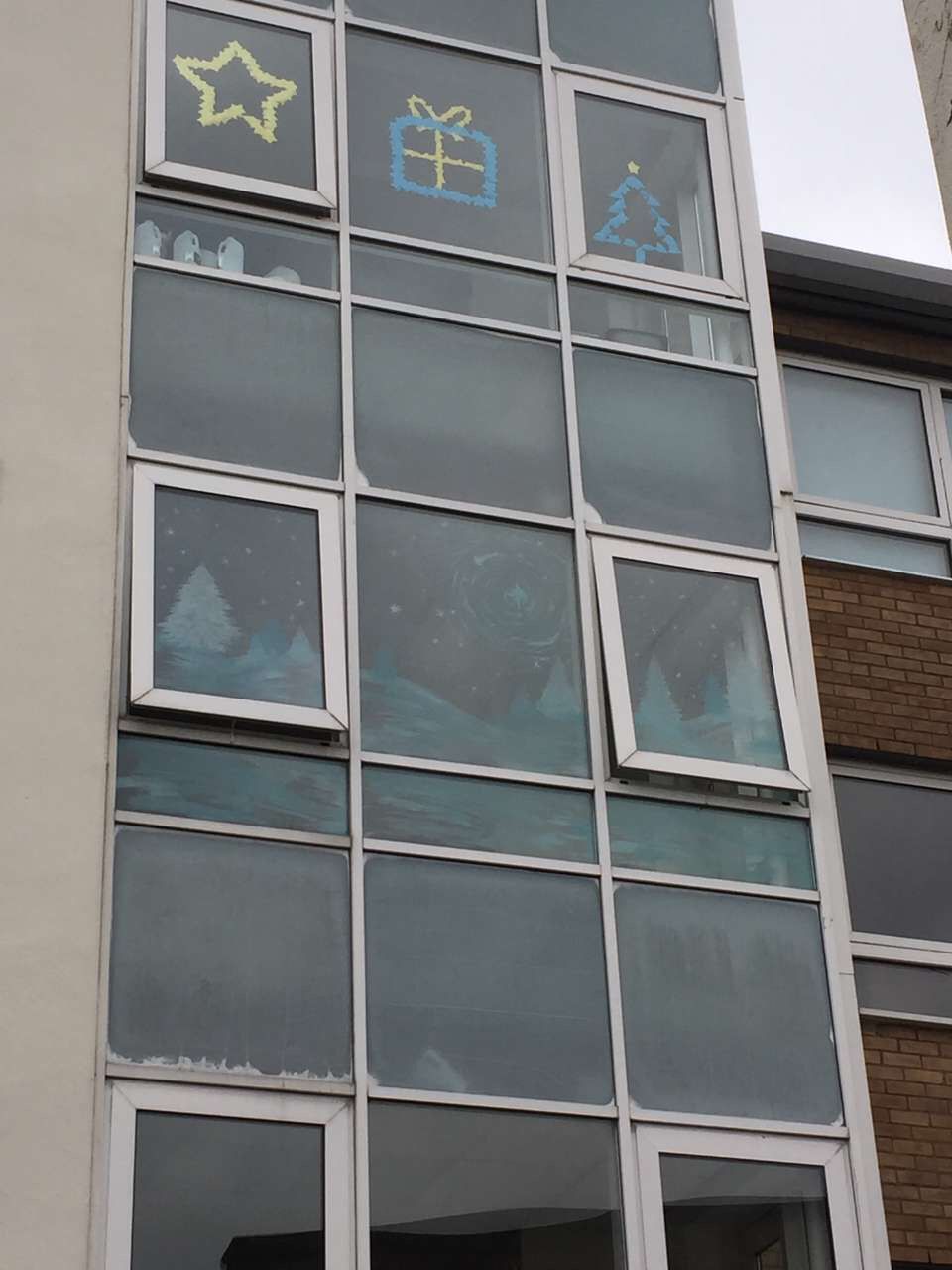 Image may contain: Window, Office Building, Building
