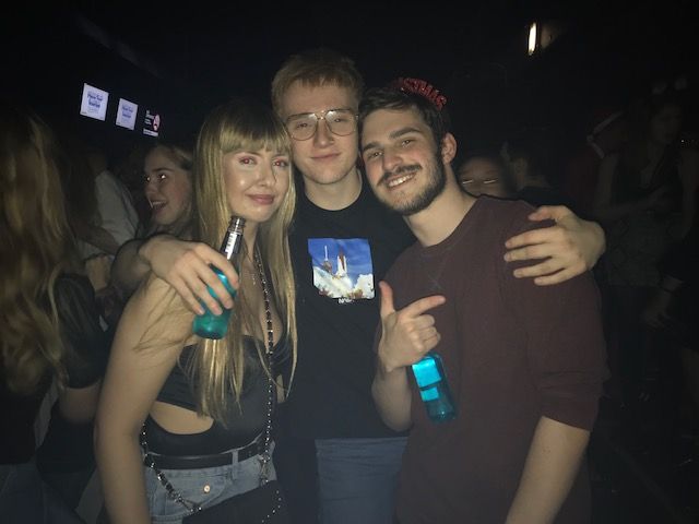 Image may contain: Alcohol, Night Club, Lighting, Club, Beverage, Drink, Party, Night Life, Human, Person