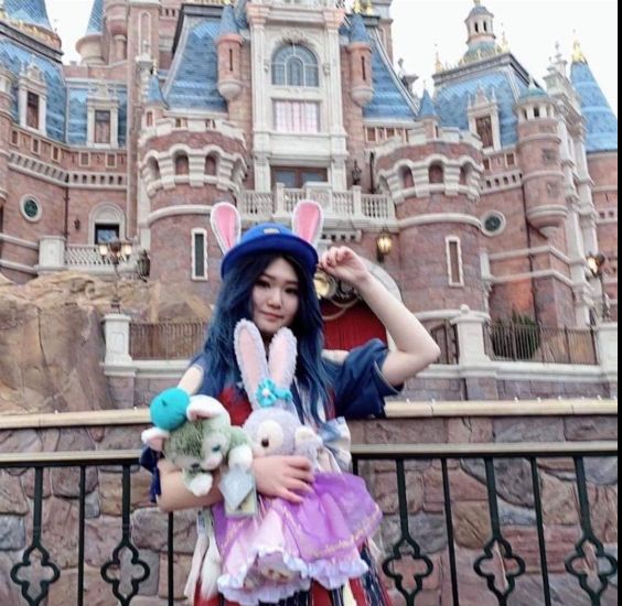 Image may contain: Amusement Park, Theme Park, Girl, Woman, Photography, Portrait, Photo, Dress, Face, Fort, Human, Person, Female, Vacation, Clothing, Apparel, Castle, Palace, Architecture, Mansion, House, Building, Housing, Costume