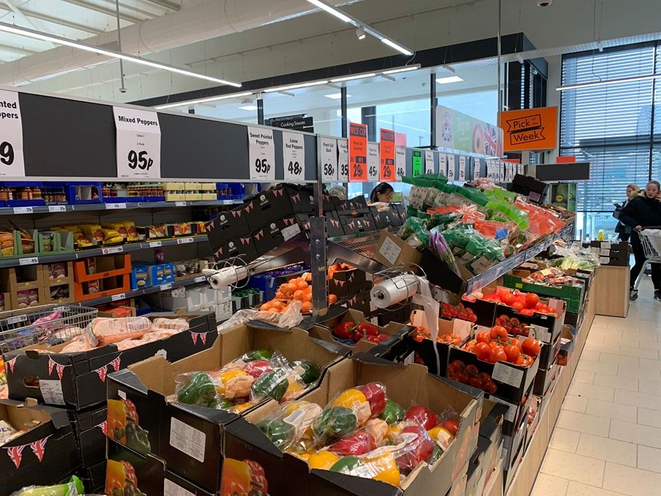 Image may contain: Supermarket, Market, Shop, Grocery Store, Person, Human