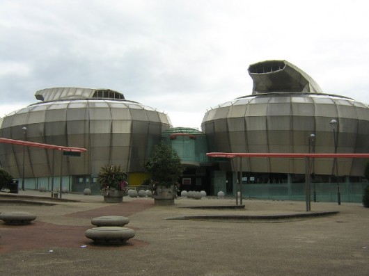 Two giant metallic curling stones