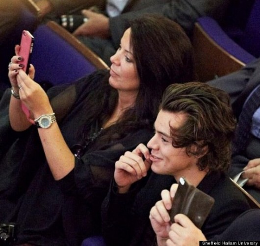 A photo of mother Anne Cox taking a photo
