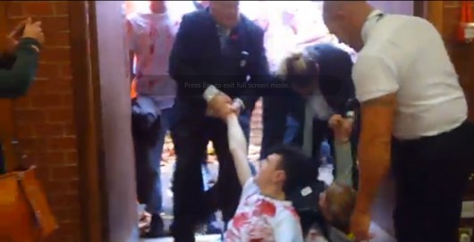 protester dragged out