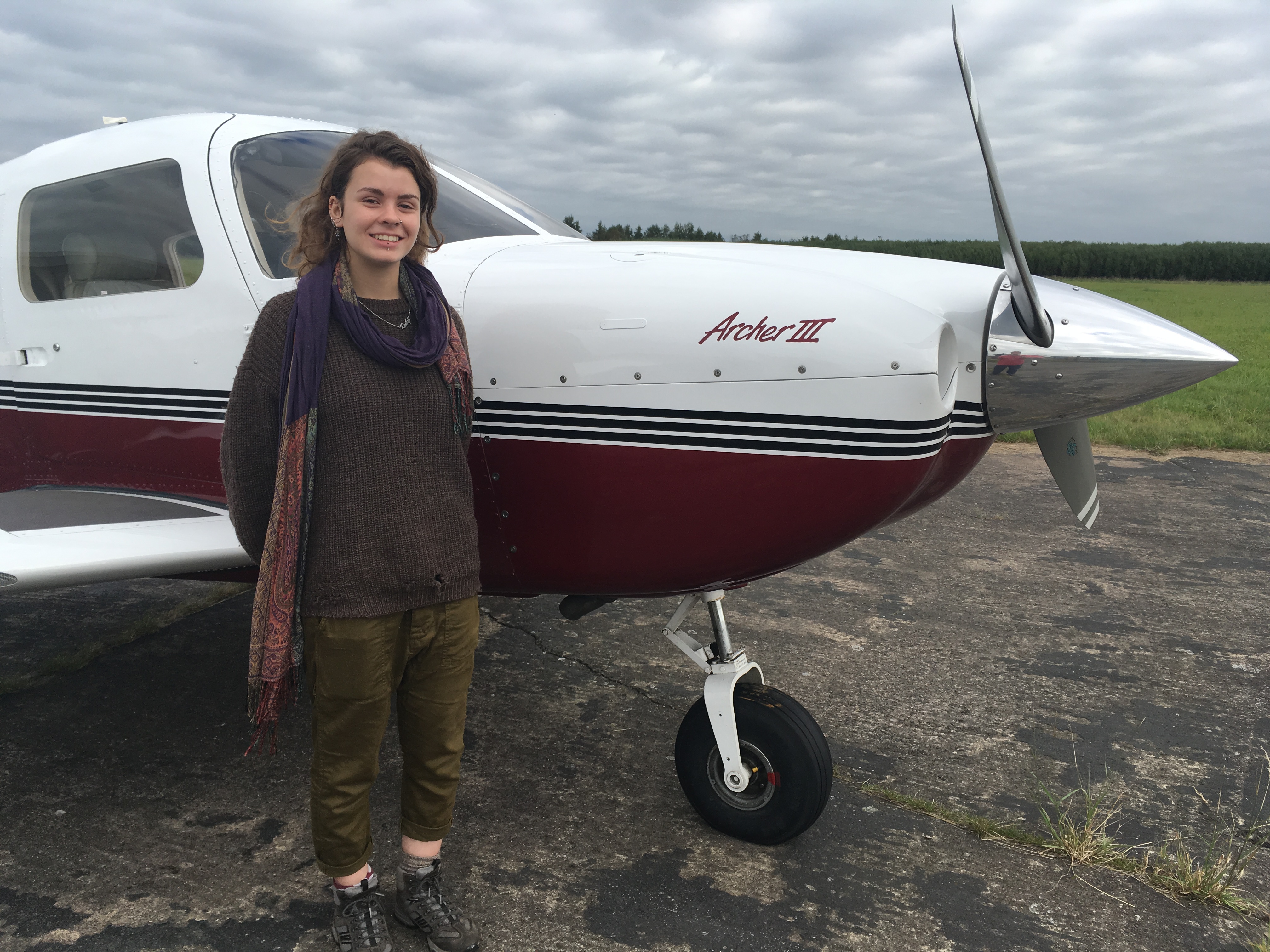 A happy tenant with feet back on the ground, after her flying experience with Ted.