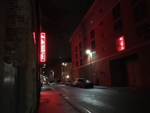 Image may contain: Outdoors, Night, Urban, Town, Street, Road, City, Building, Alleyway, Alley