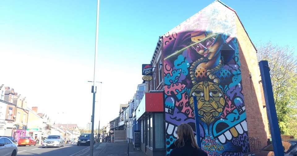 Image may contain: Town, Street, Road, Wall, Mural, Graffiti, Art