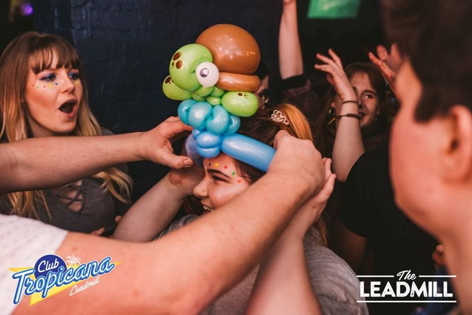 Image may contain: Party, Sphere, Ball, Person, People, Human