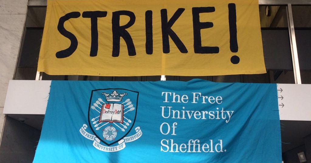 Image may contain: Banner, Text, Alphabet