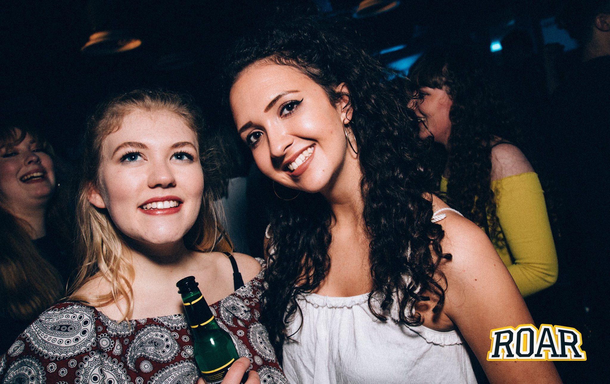 Image may contain: Bottle, Make Out, Night Life, Night Club, Club, Person, People, Human