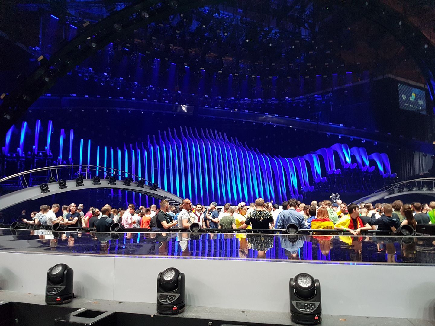 Image may contain: Person, Human, Crowd, Audience, Stage, Toaster, Electrical Device, Appliance