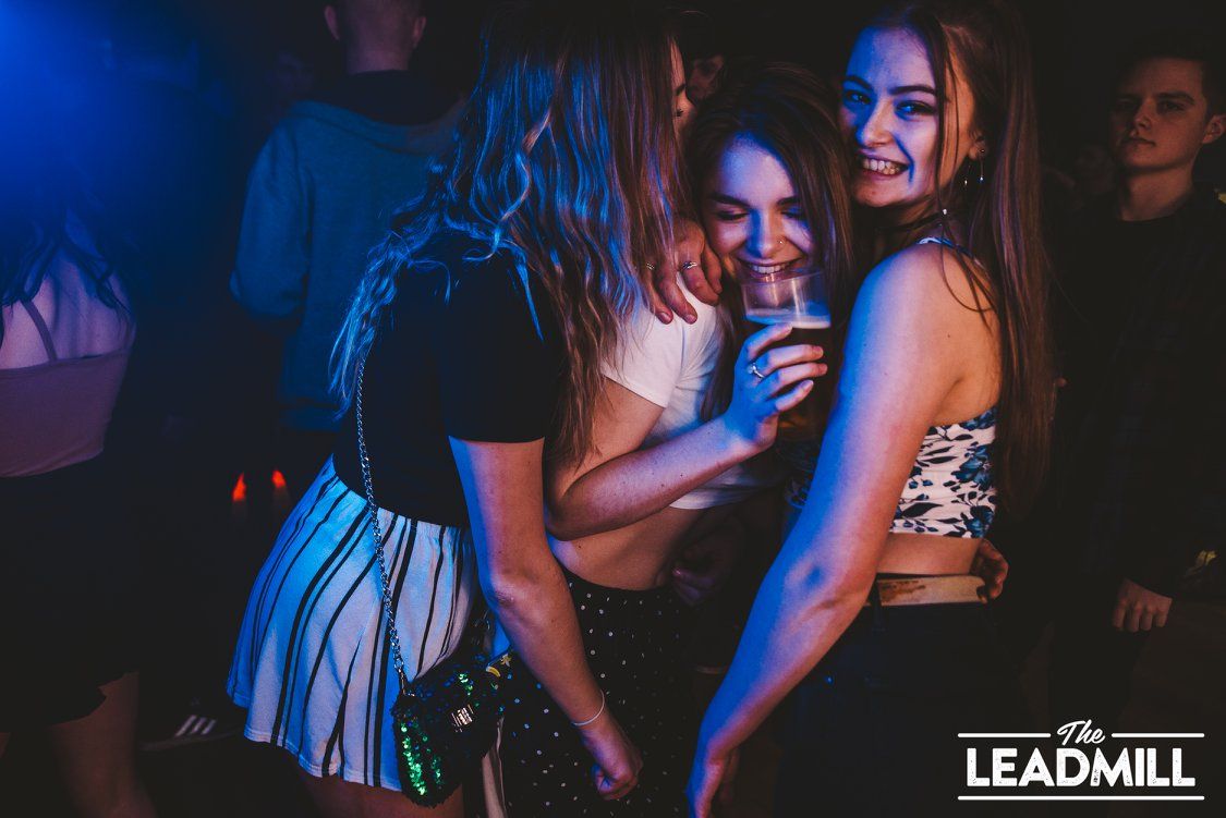 Image may contain: Night Life, Night Club, Club, Poster, Person, People, Human