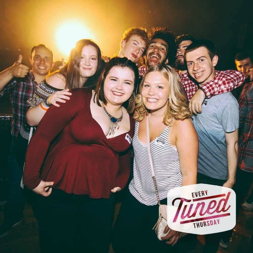 Image may contain: Laughing, Party, Music, Leisure Activities, Smile, Portrait, Face, Person, People, Human
