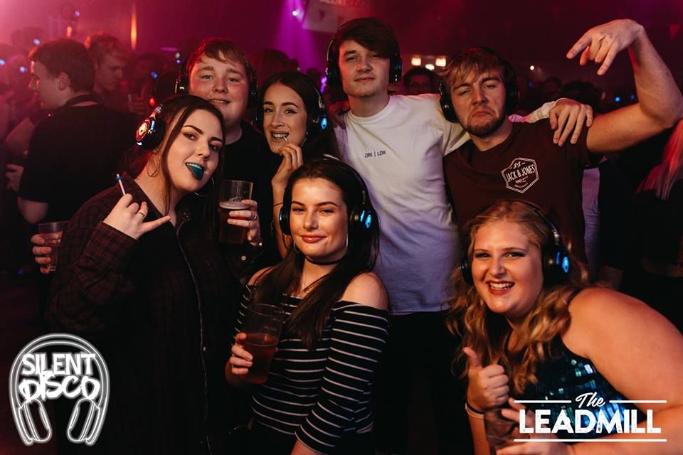 Image may contain: Party, Smile, Portrait, Face, Crowd, Club, Music, Leisure Activities, Person, People, Human