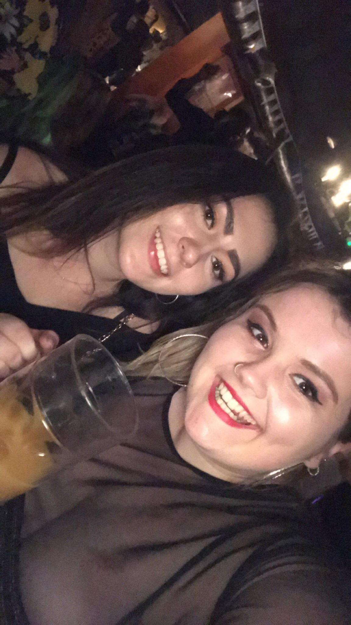 Image may contain: Night Life, Smile, Portrait, Face, Person, People, Human