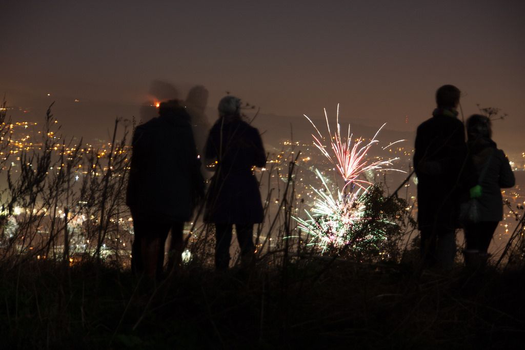 Image may contain: Silhouette, Outdoors, Night, Fireworks, Person, People, Human