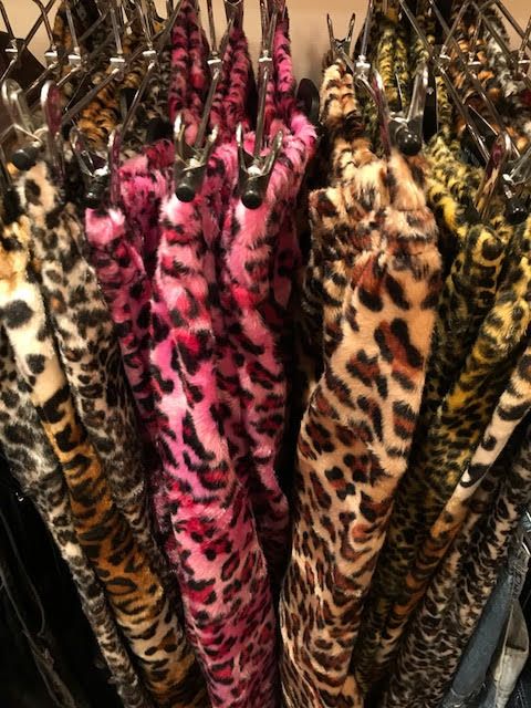 Image may contain: Animal, Leopard, Panther, Mammal, Jaguar, Wildlife, Apparel, Clothing