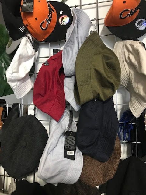 Image may contain: Cap, Hat, Crash Helmet, People, Bag, Backpack, Human, Person, Helmet, Apparel, Clothing