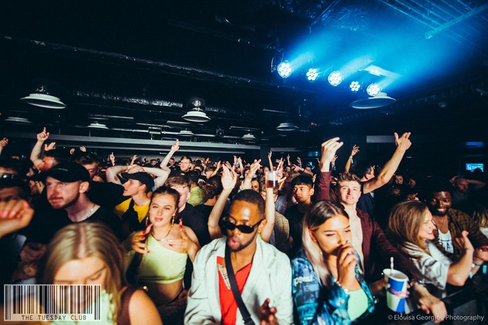 Image may contain: Face, Lighting, Night Club, Audience, Club, Crowd, Night Life, Accessory, Sunglasses, Accessories, Party, Human, Person