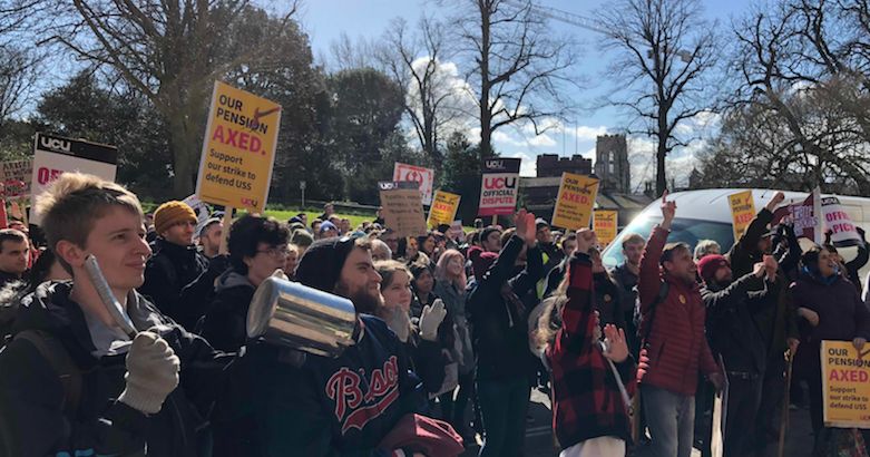 Image may contain: Text, Vehicle, Transportation, People, Crowd, Protest, Parade, Person, Human
