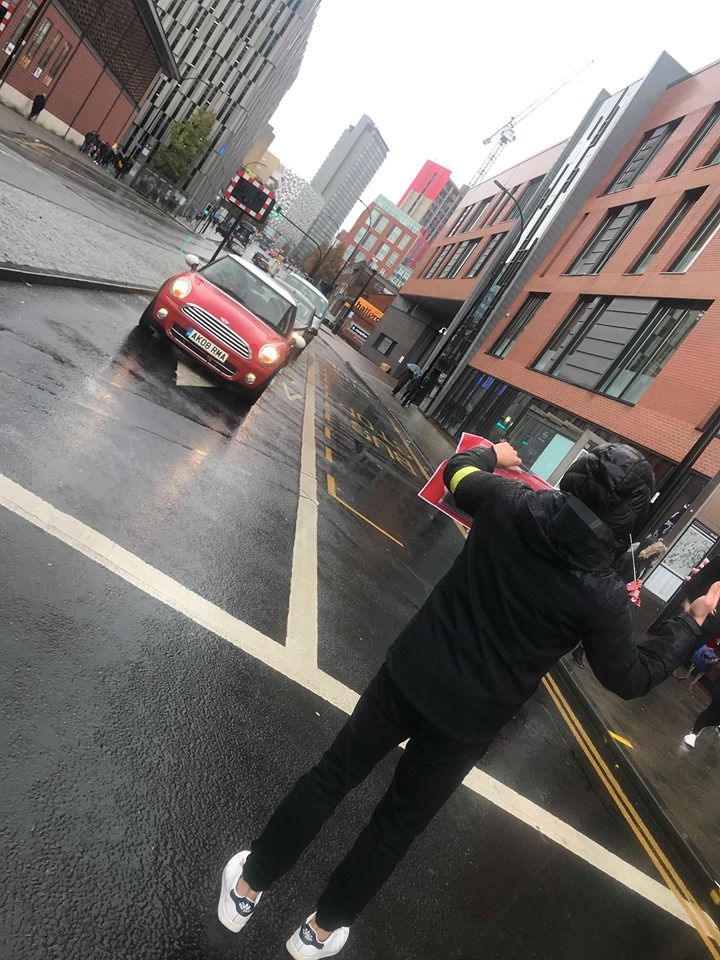 Image may contain: Zebra Crossing, Freeway, Intersection, Pedestrian, Human, Person, Apparel, Clothing, Footwear, Shoe, Transportation, Vehicle, Automobile, Car, Asphalt, Tarmac, Road