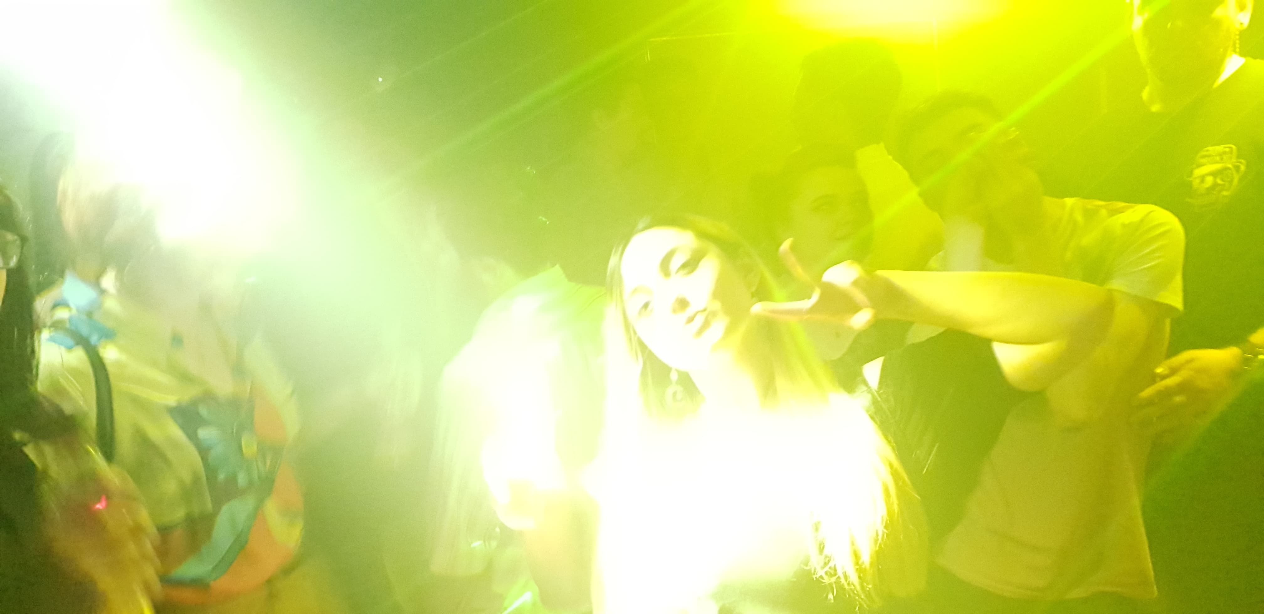 Image may contain: Human, Person, Night Club, Club, Light, Flare