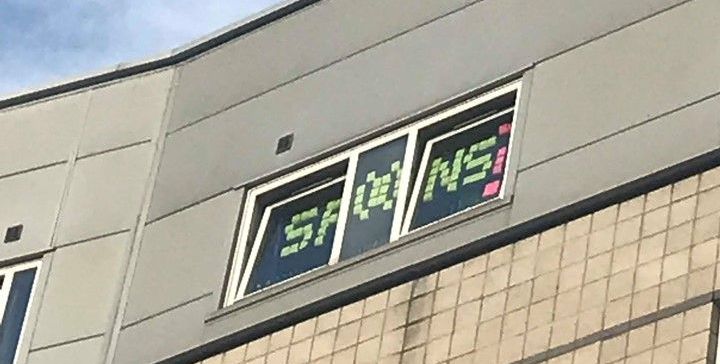 Image may contain: Scoreboard, Symbol, Brick