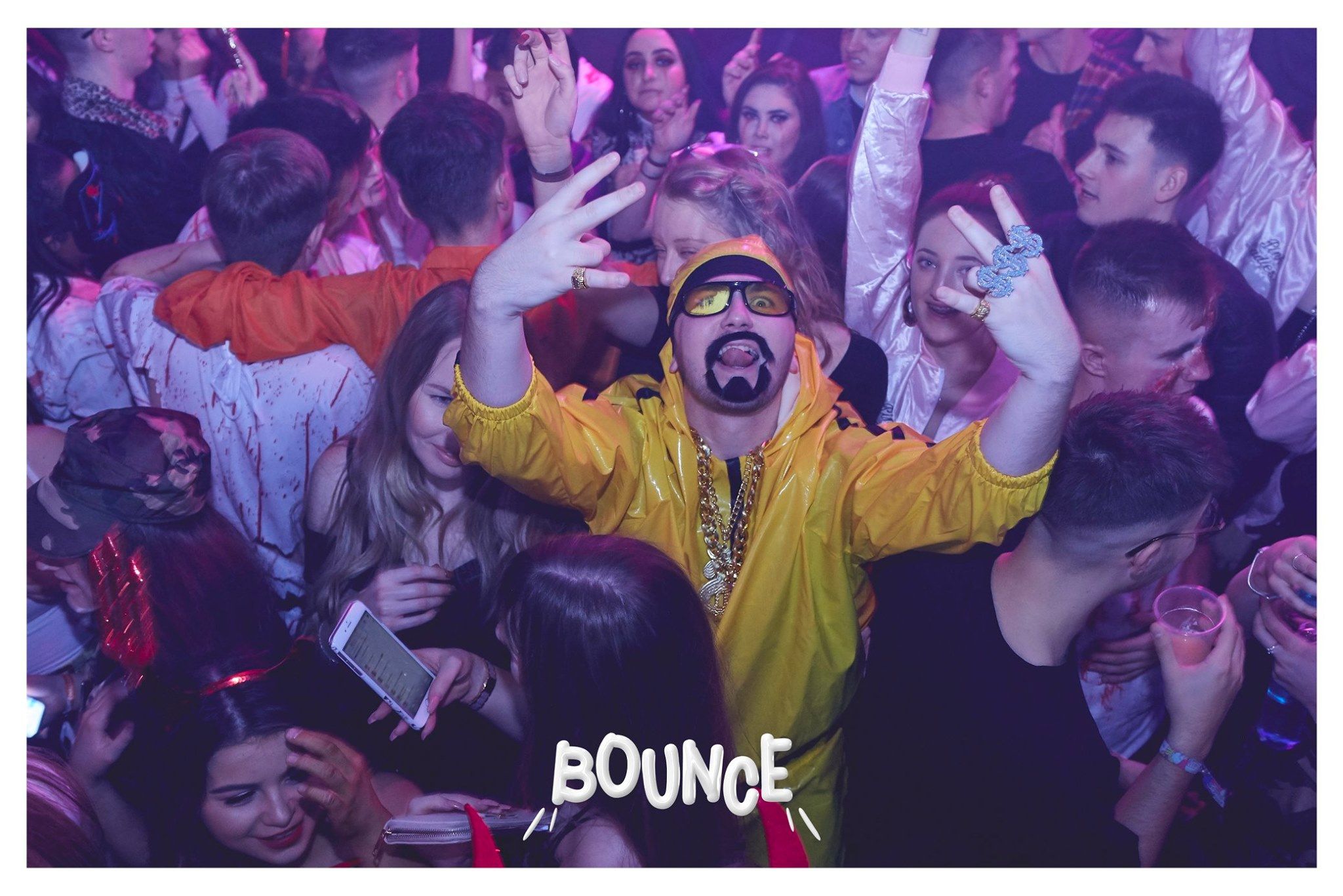Image may contain: Leisure Activities, Crowd, Sunglasses, Accessories, Accessory, Night Club, Club, Party, Human, Person