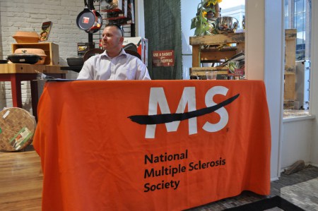 A volunteer at a fundraising event.