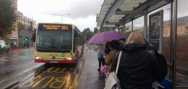 Image may contain: Bus, Vehicle, Trolley, Transportation, Tram, Streetcar, Cable Car, Suitcase, Luggage, Person, People, Human