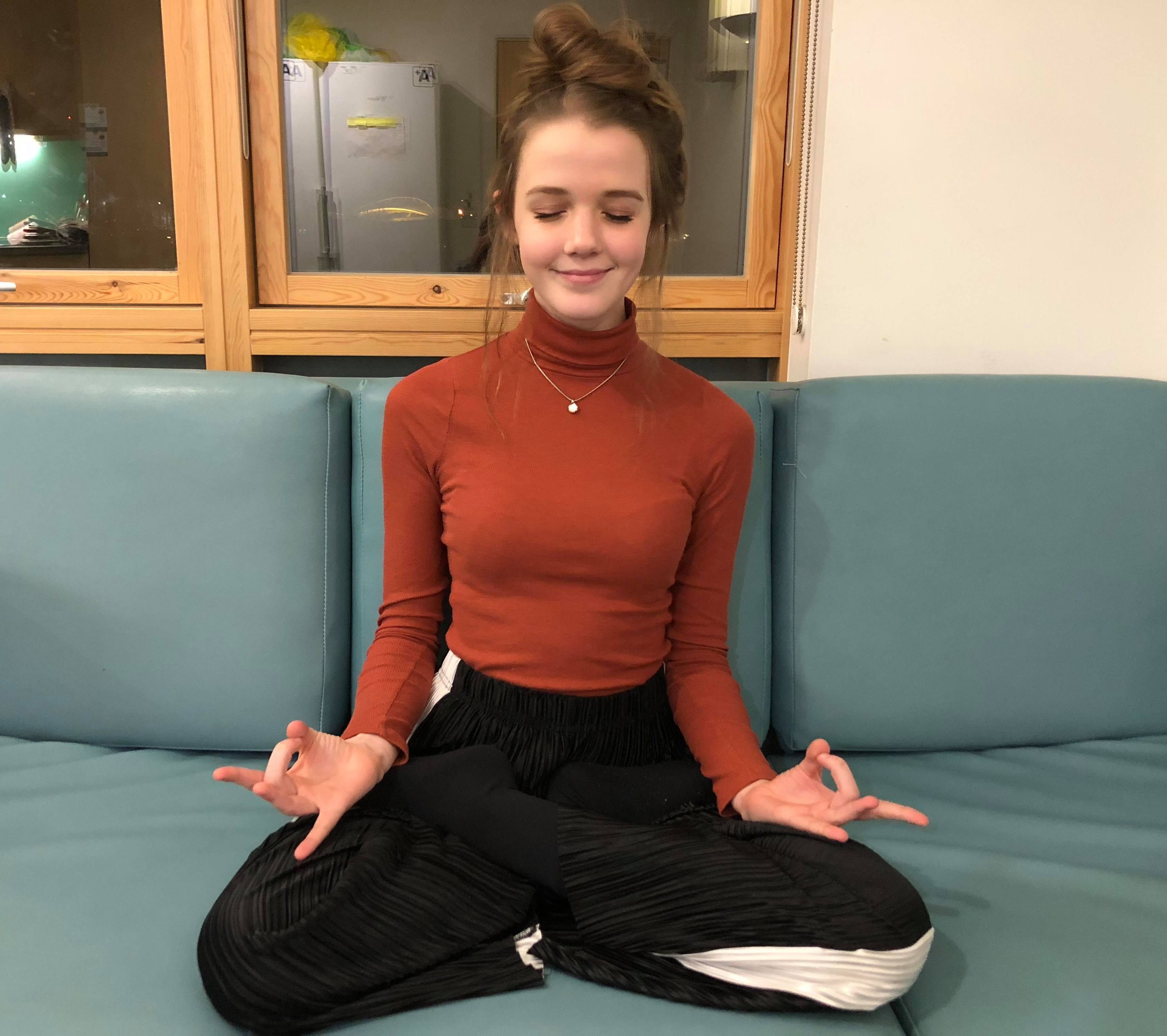 Image may contain: Yoga, Working Out, Stretch, Sports, Sport, Fitness, Exercise, Furniture, Couch, Person, People, Human