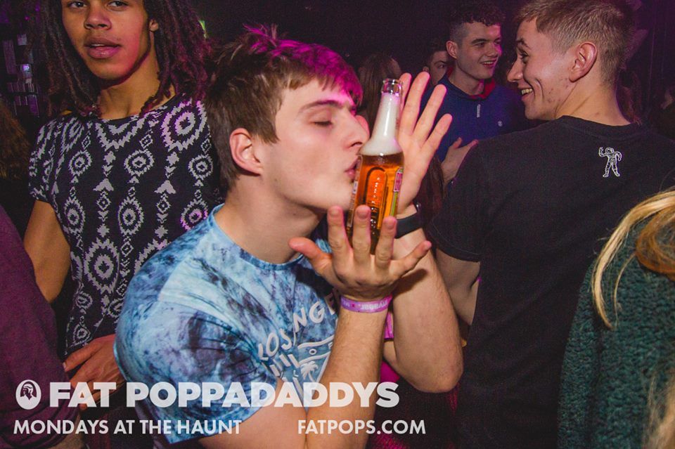 Image may contain: Drink, Beverage, Alcohol, Night Life, Night Club, Club, Person, People, Human