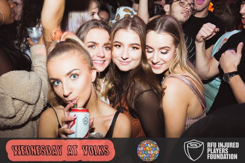 Image may contain: Party, Crowd, Music, Leisure Activities, Cup, Person, People, Human