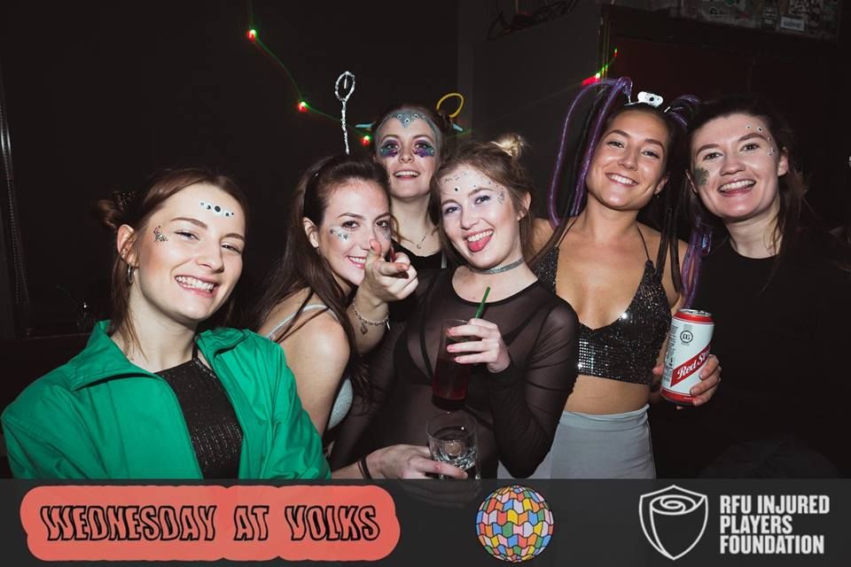 Image may contain: Party, Drink, Beverage, Alcohol, Sphere, Ball, Music, Leisure Activities, Person, People, Human