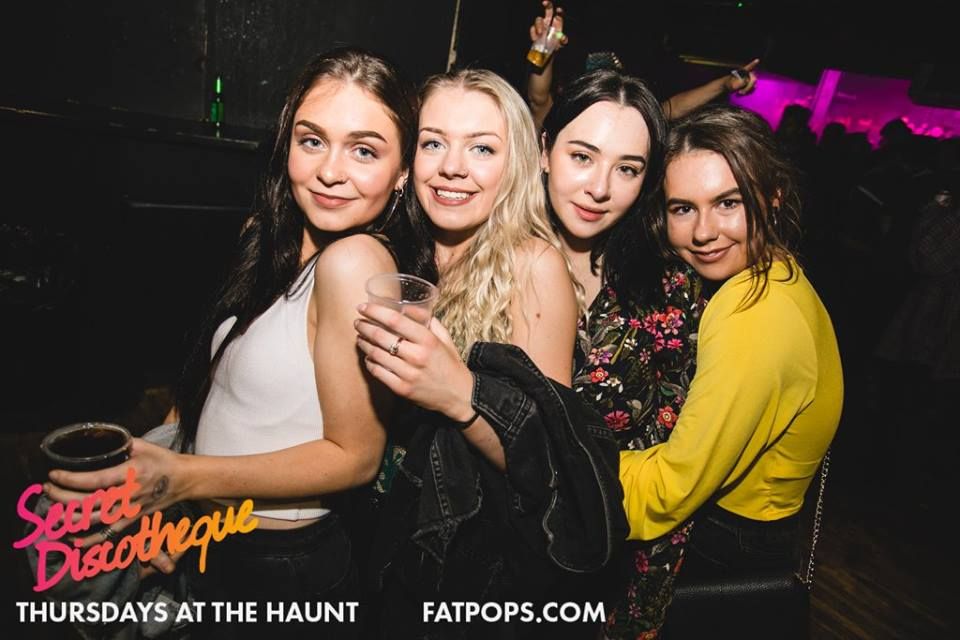 Image may contain: Night Life, Night Club, Club, Drink, Beverage, Alcohol, Party, Robe, Kimono, Gown, Clothing, Vase, Pottery, Potted Plant, Plant, Jar, Flora, Person, People, Human