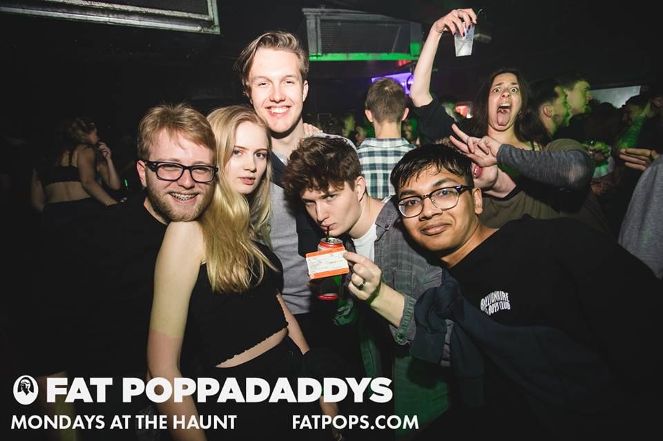 Image may contain: Night Life, Party, Vase, Pottery, Potted Plant, Plant, Jar, Flora, Drink, Beverage, Alcohol, Person, People, Human