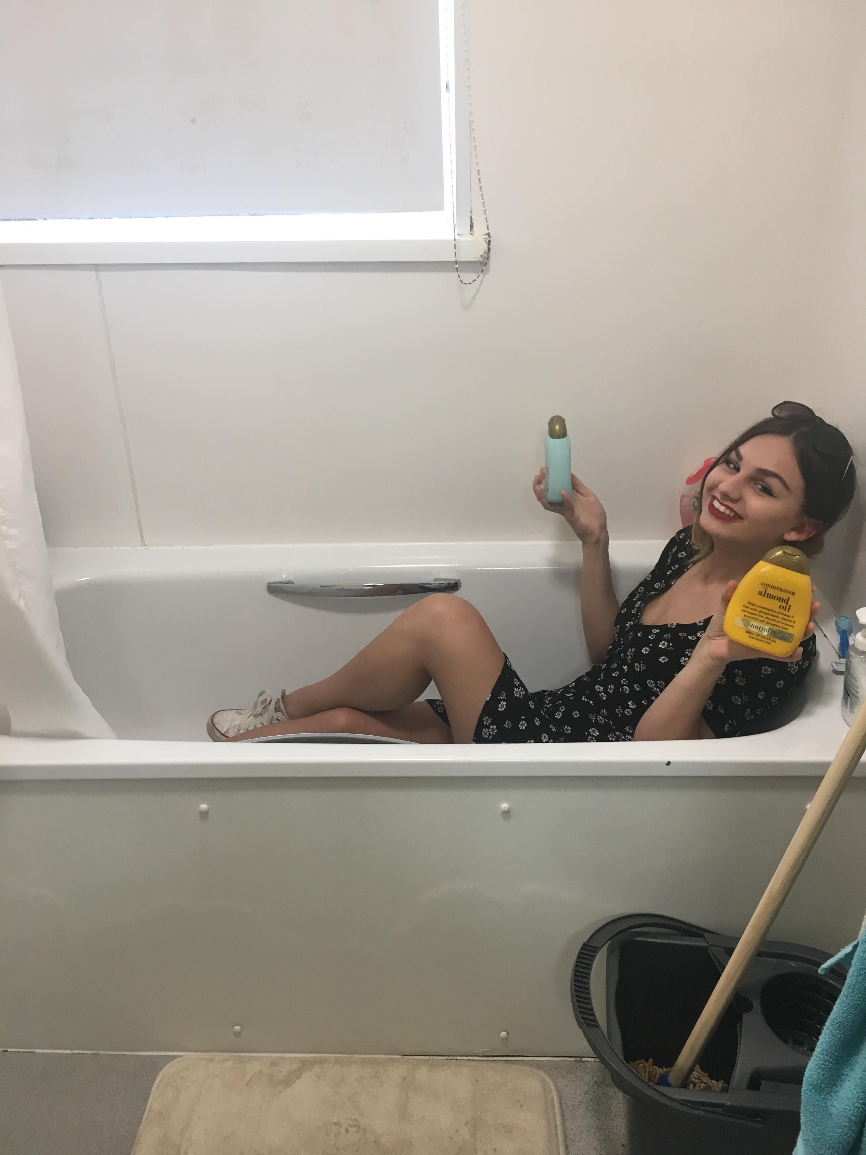 Image may contain: Bathtub, Tub, Person, People, Human