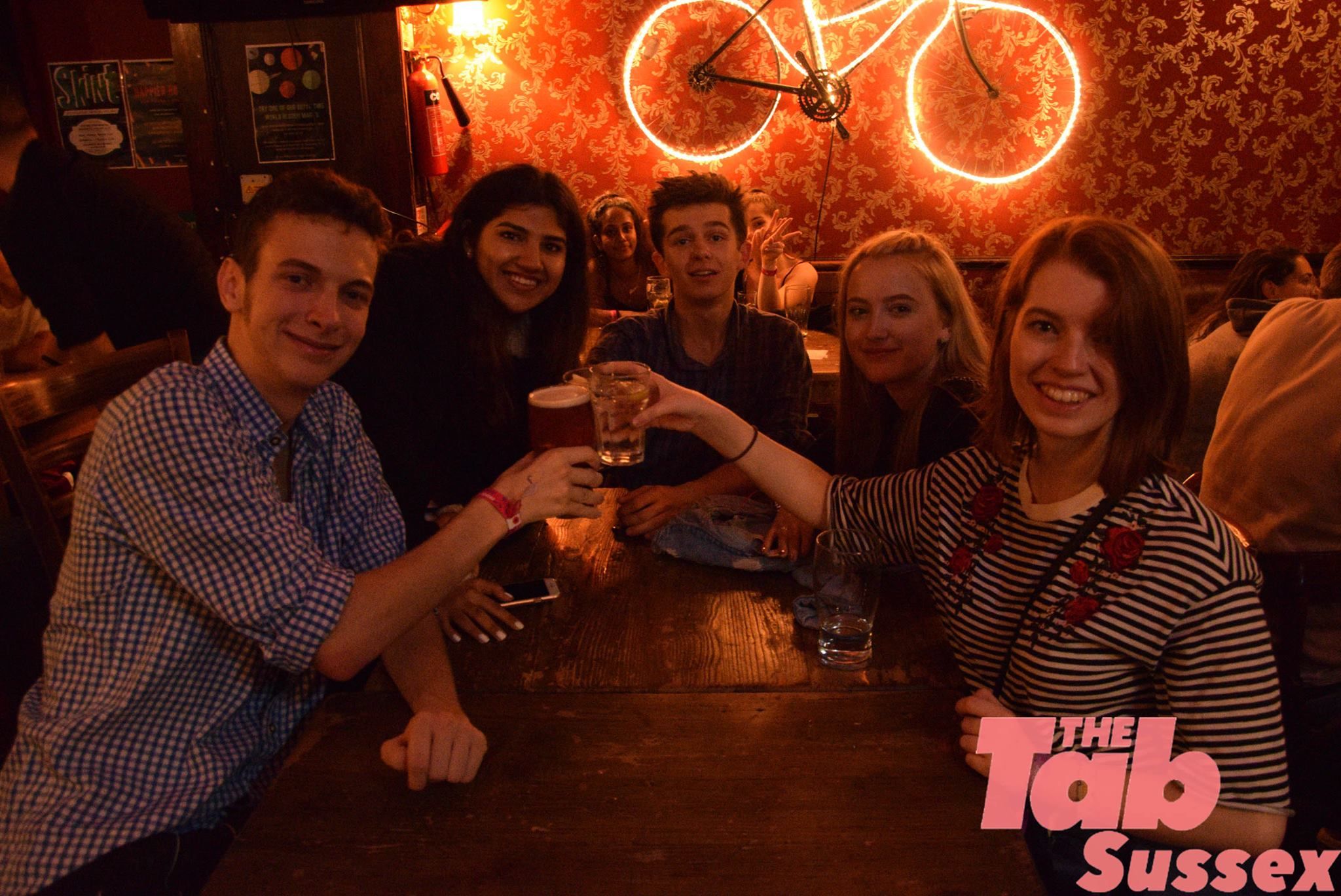Image may contain: Night Life, Party, Pub, Bar Counter, Person, People, Human