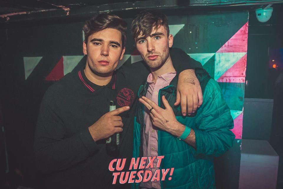 Image may contain: Night Life, Night Club, Club, Poster, Person, People, Human