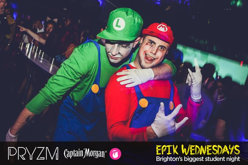 Image may contain: Leisure Activities, Dj, Disco, Apparel, Hat, Clothing, Party, Night Club, Club, Human, Person