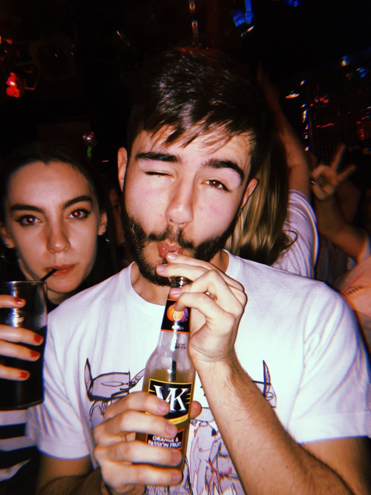 Image may contain: Night Life, Bottle, Bar Counter, Pub, Alcohol, Beer, Drink, Beverage, Person, Human