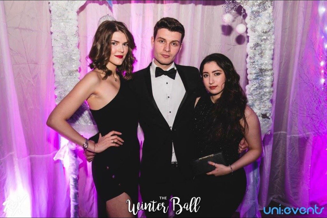 Image may contain: Suit, Coat, Overcoat, Photo Booth, Evening Dress, Gown, Robe, Clothing, Apparel, Premiere, Fashion, Human, Person, Accessory, Accessories, Tie