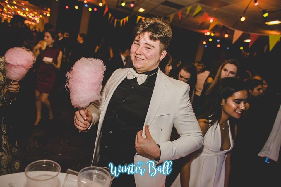 Image may contain: Dating, Night Life, Bar Counter, Pub, Party, Night Club, Club, Clothing, Coat, Suit, Overcoat, Apparel, Human, Person