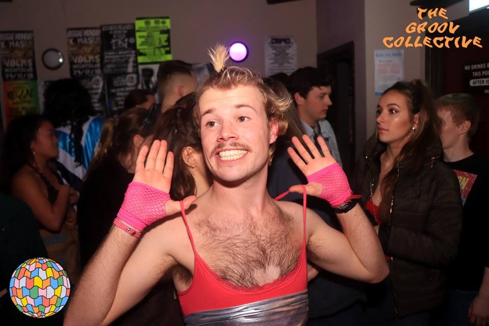 Image may contain: Night Club, Clothing, Apparel, Night Life, Club, Human, Person