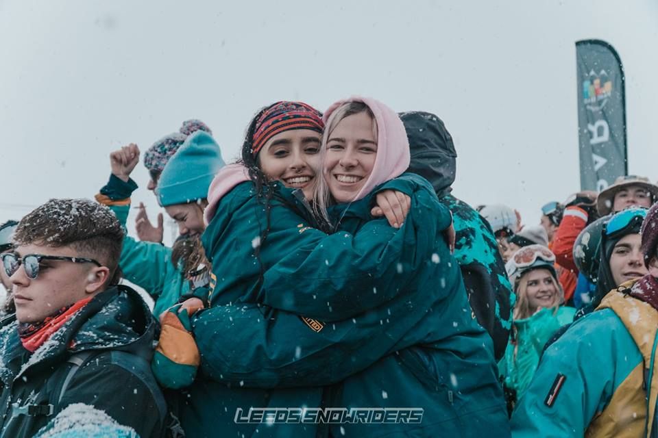 Image may contain: Vacation, Jacket, Smile, Coat, Nature, Outdoors, Crowd, People, Face, Accessory, Sunglasses, Accessories, Clothing, Apparel, Human, Person