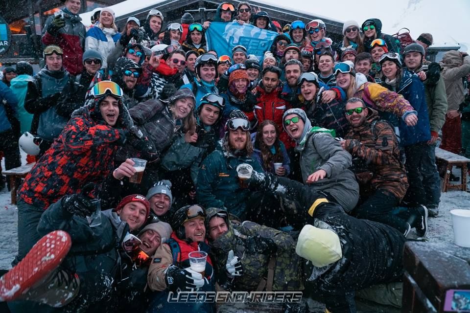 Image may contain: Vehicle, Photography, Portrait, Photo, Outdoors, Transportation, Hood, People, Sunglasses, Accessory, Accessories, Crowd, Coat, Face, Human, Person, Clothing, Apparel