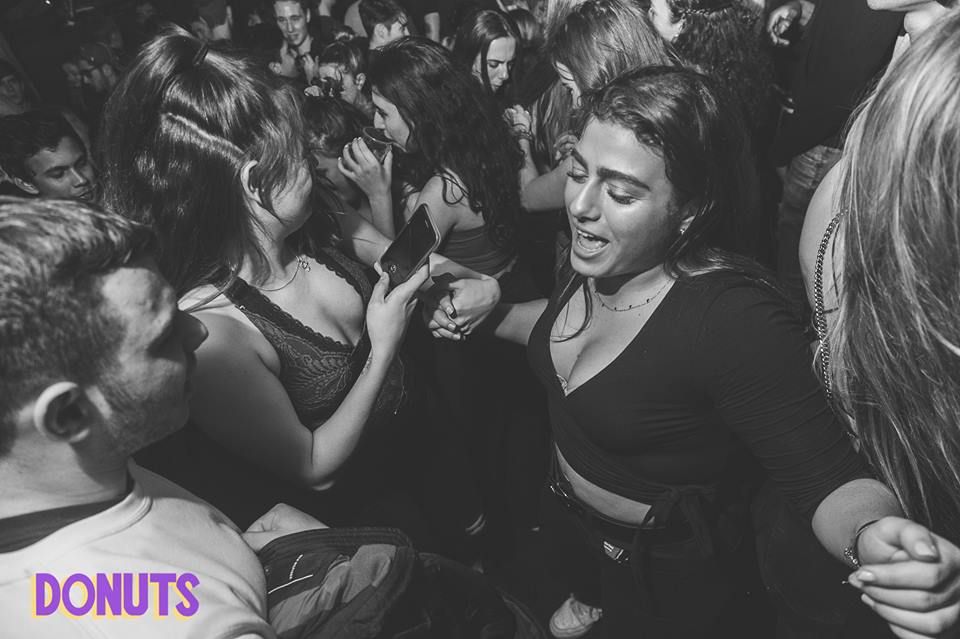 Image may contain: Crowd, Audience, Night Club, Club, Party, Human, Person